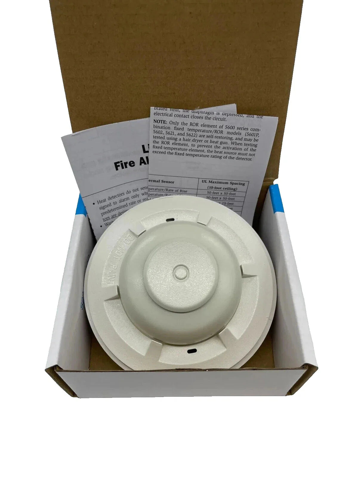 System Sensor 5601P smoke detector with Jem Systems Canada label, featuring a round white sensor with mounting base