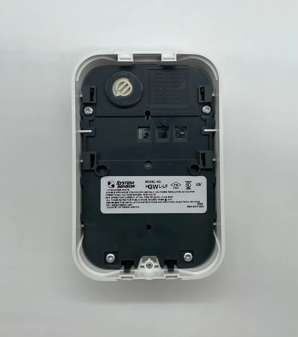 System Sensor HGWL-LF low-profile wall mount fire alarm with sleek design and visible sensor components.
