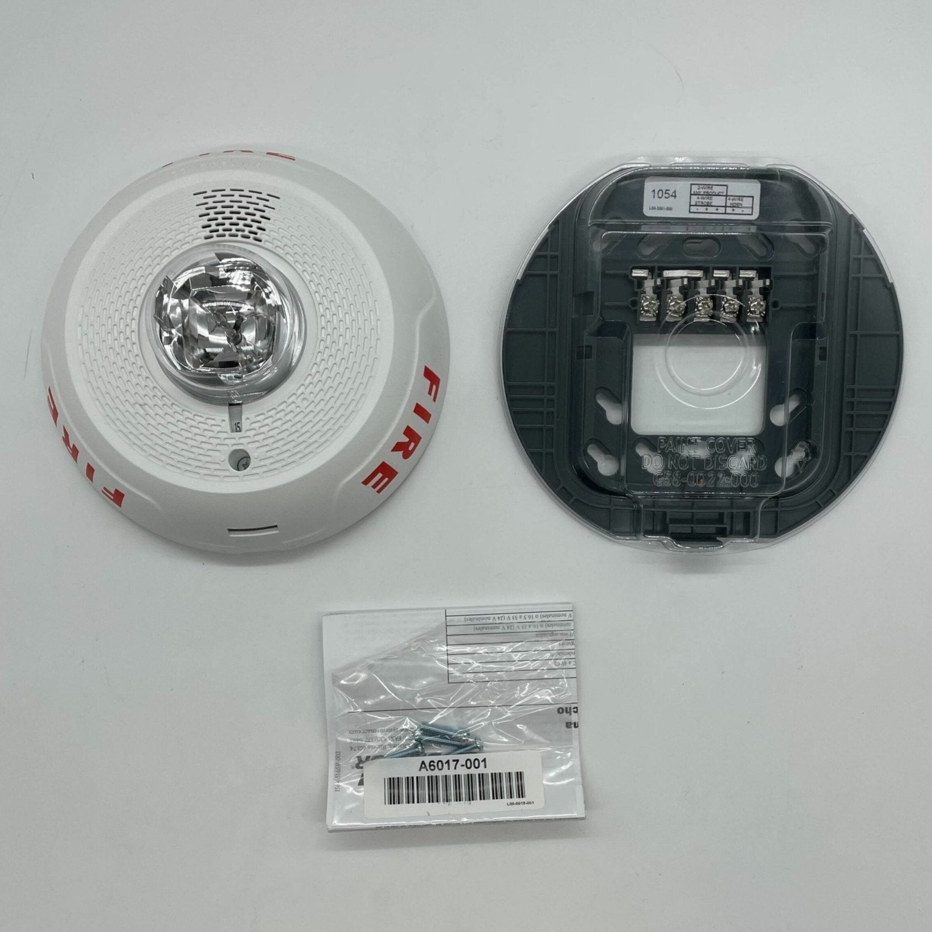 System Sensor PC4WL fire alarm control panel with wiring and interface components on a white background.