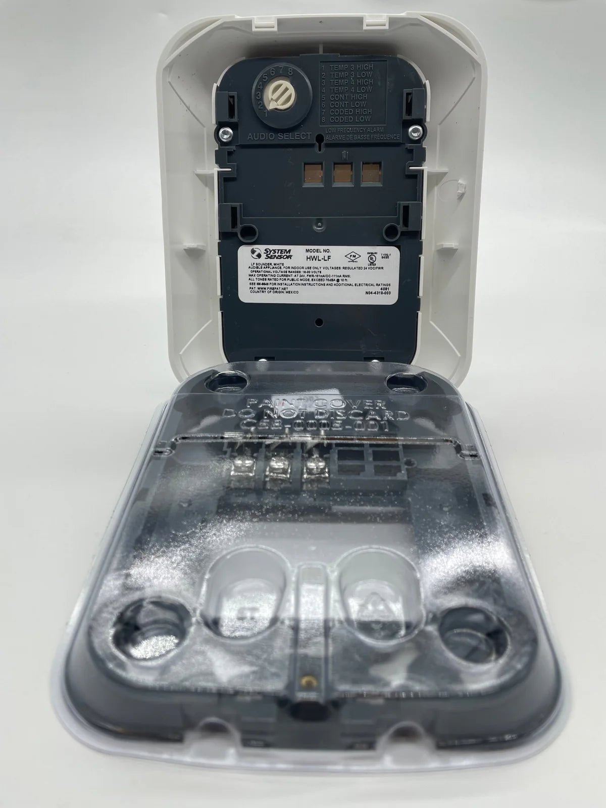 System Sensor HWL-LF low-frequency heat detector with metal housing and mounting bracket, designed for fire safety applications.