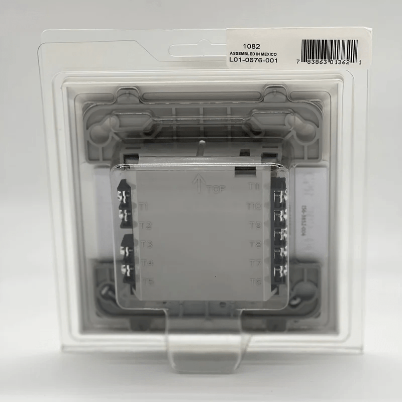 System Sensor M500R fire alarm sensor mounted on ceiling, with wiring and mounting hardware visible.