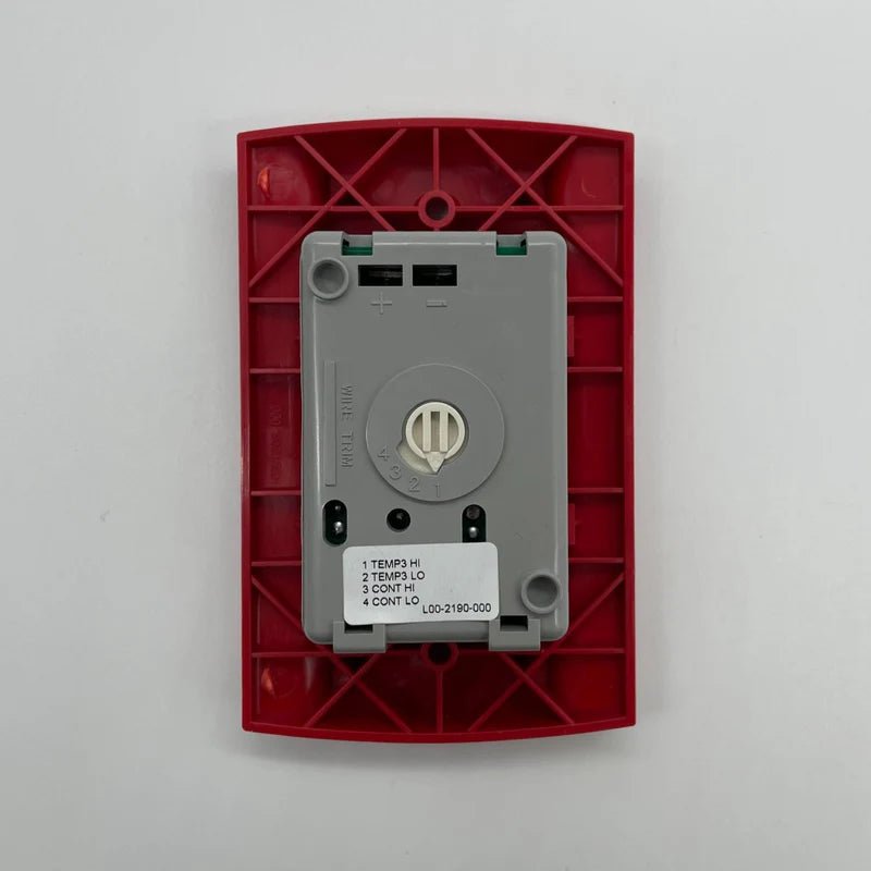 System Sensor MHR heat detector showing a round white sensor with mounting bracket on a ceiling.