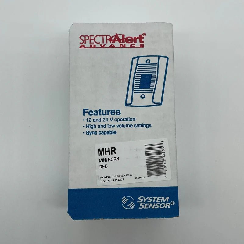 System Sensor MHR heat detector mounted on ceiling, with alarm and wiring visible, designed for fire safety in commercial buildings.