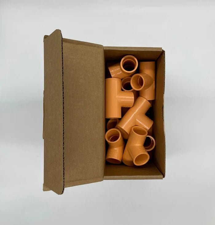 System Sensor P-TEE fire alarm fitting with threaded connections and brass body, used for sprinkler systems and fire safety installations.