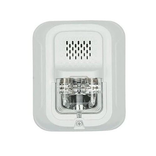 System Sensor P2GWLED LED emergency lighting fixture with rugged metal housing and clear lens, designed for commercial safety applications.