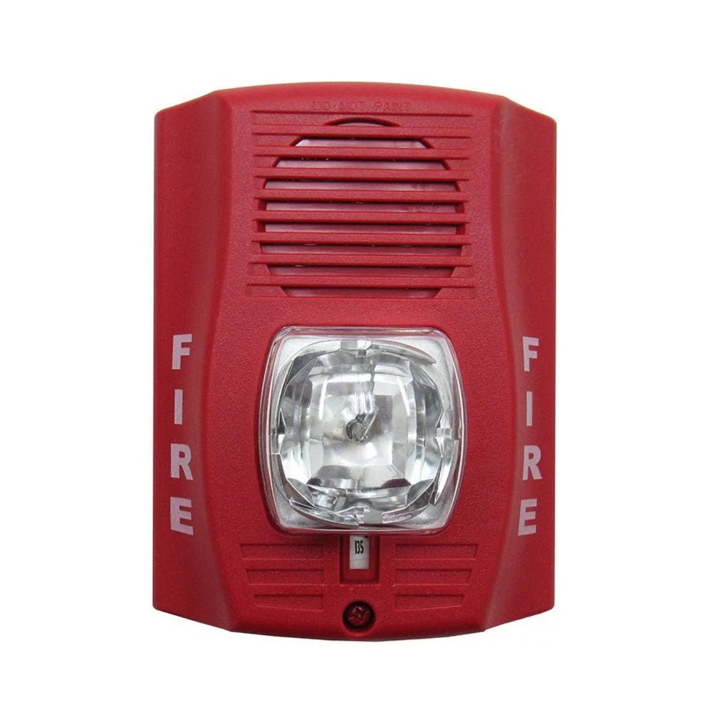 System Sensor P2RH-LF smoke detector with red LED indicator, mounted on ceiling in a commercial building interior.