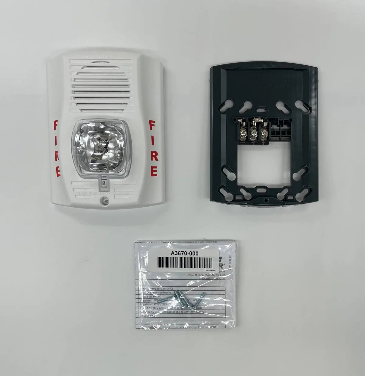 System Sensor P2WH-LF wireless smoke detector with integrated heat sensor, mounted on ceiling in a commercial setting