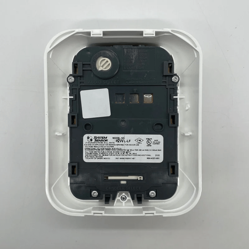 System Sensor P2WL-LF smoke detector with integrated alarm and sensor components, designed for building safety.