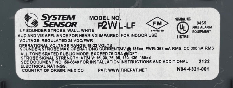 System Sensor P2WL-LF smoke detector with dual ionization and photoelectric sensors, mounted on ceiling in a commercial setting.