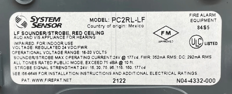 System Sensor PC2RL-LF smoke detector with alarm indicator and mounting base, designed for fire safety systems.