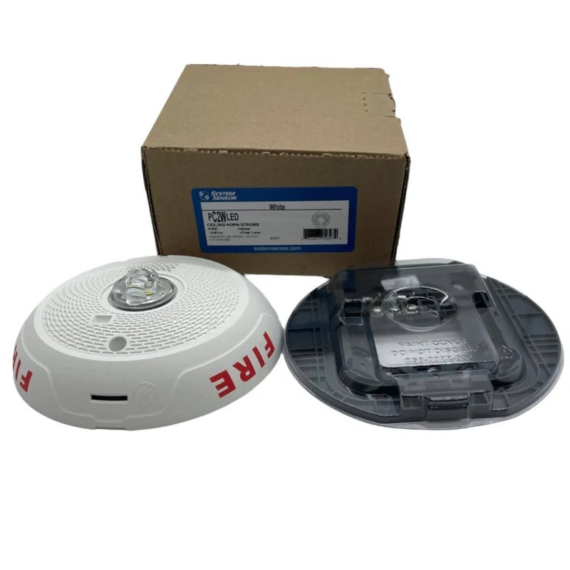System Sensor PC2WLED wireless LED strobe and speaker combination device with mounting hardware and wiring.