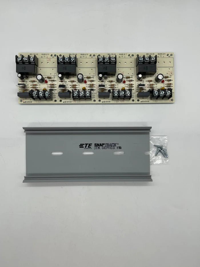 System Sensor R-14T fire alarm detector with tamper switch, mounted on ceiling, in black plastic housing.
