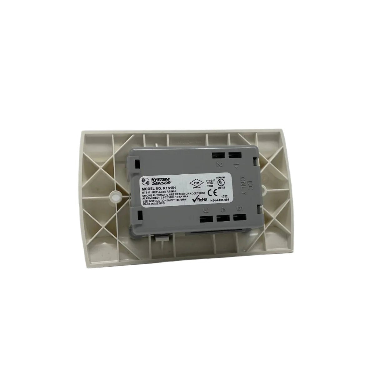 System Sensor RTS151 fire alarm detector with white plastic housing and mounting bracket, designed for building safety.