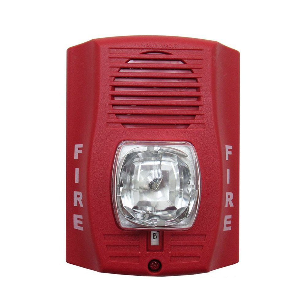 System Sensor P2RH-LF smoke detector with red LED indicator, mounted on ceiling in a commercial building interior.