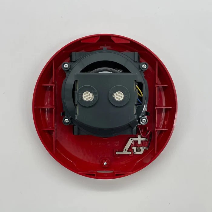 System Sensor SPCRL fire alarm relay module mounted on a panel, used for integrating detection systems in commercial buildings.