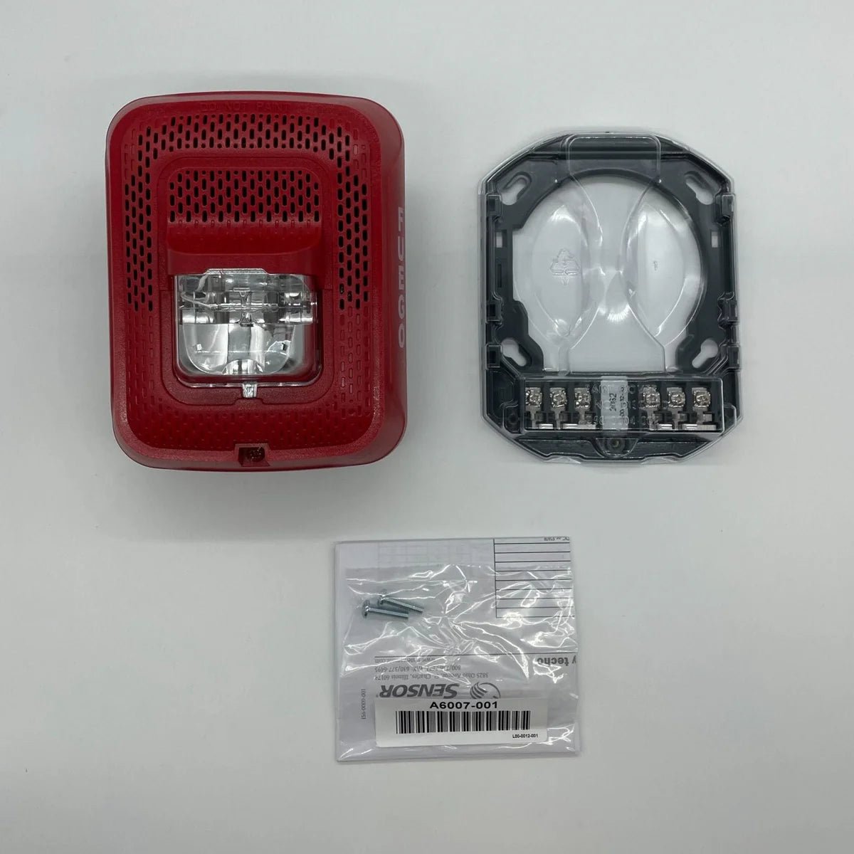 System Sensor SPSRL-SP fire alarm relay module, shown in a close-up image with circuit connections and mounting hardware.