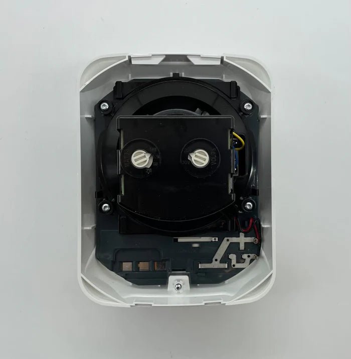 System Sensor SPSWL-P fire alarm sensor with wiring and mounting hardware on a white background.