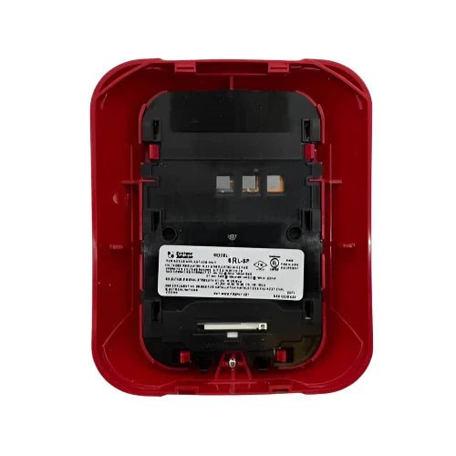 System Sensor SRL-SP fire alarm sensor with white casing and mounting bracket, designed for building safety systems.