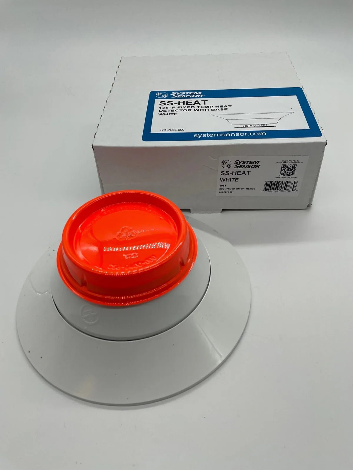 System Sensor SS-HEAT heating sensor with digital display and wiring terminals for climate control applications.