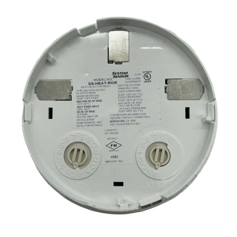 System Sensor SS-HEAT-ROR heat detector with red indicator light and mounting bracket, designed for fire alarm systems.