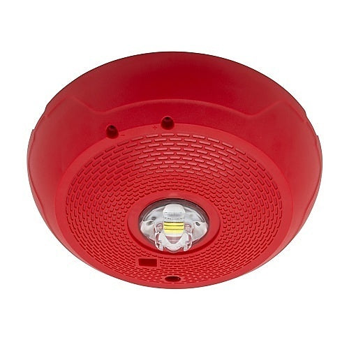 System Sensor ULC SCRLED-P fire alarm with LED indicator, mounted on wall, in a safety or commercial setting.