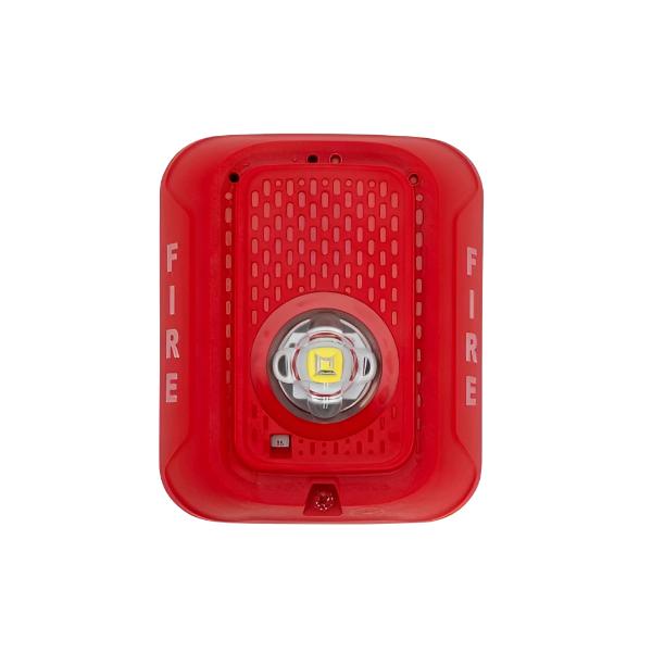 System Sensor SRLED emergency LED exit sign with red lettering and durable white housing, designed for safety and visibility.
