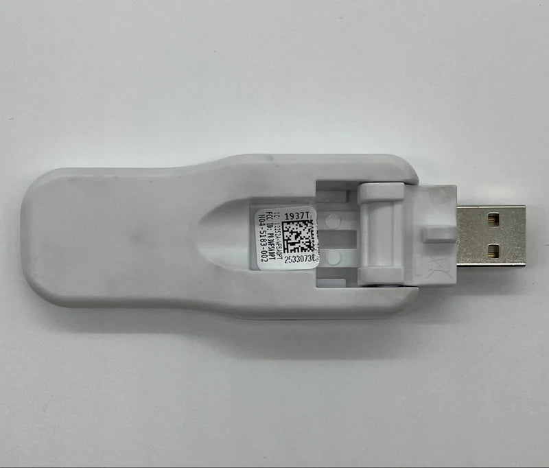 System Sensor W-USB wireless communication module for fire alarm systems, shown with USB connection and setup interface.
