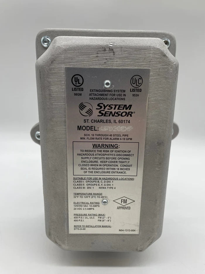 System Sensor WFD20EXP fire alarm detector with expansion module, mounted on wall in a commercial setting