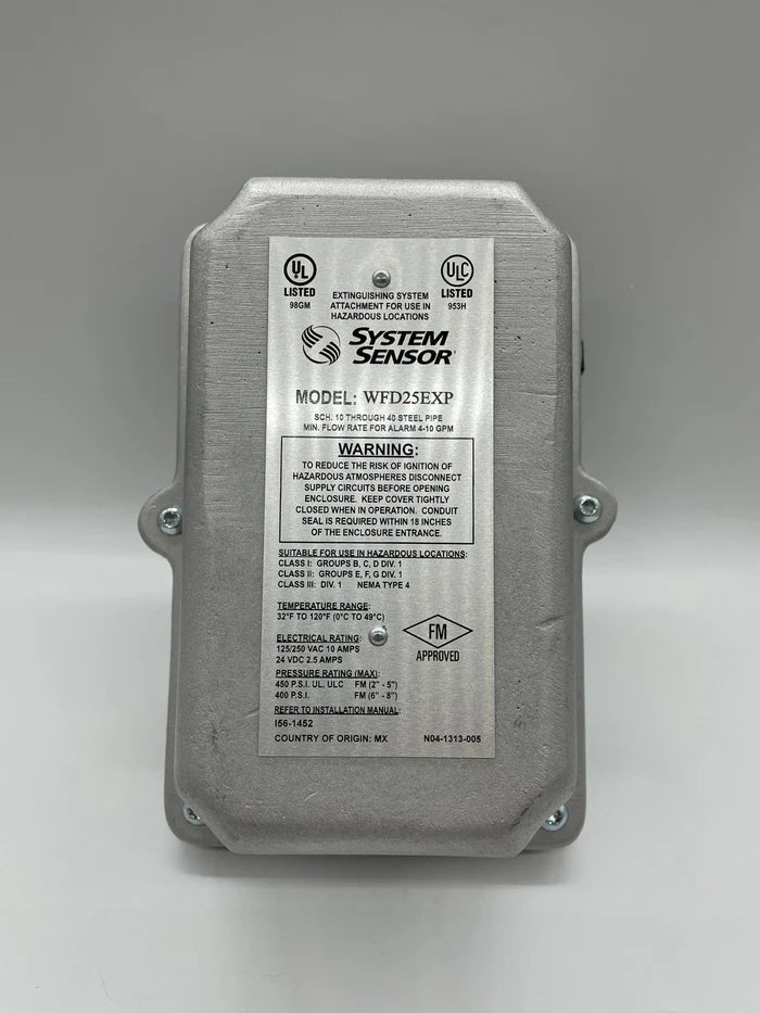 System Sensor WFD25EXP fire alarm detector mounted on ceiling, with wiring and mounting hardware visible.