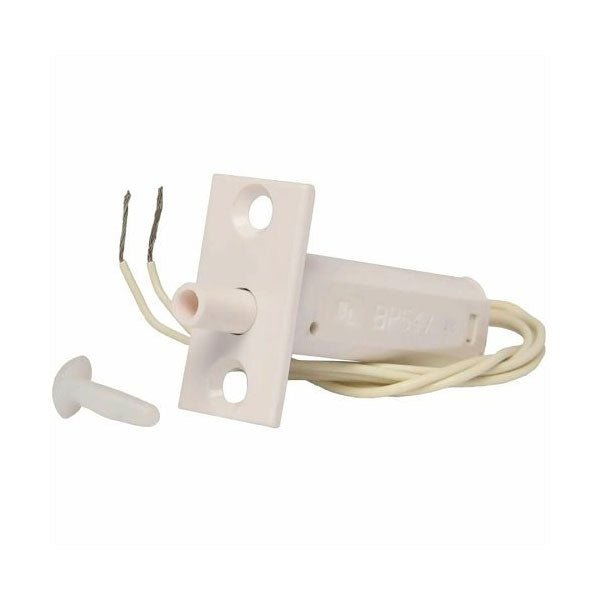 Telguard TG-TAMPER alarm system tamper switch with protective cover, installed on a security panel for tamper detection.