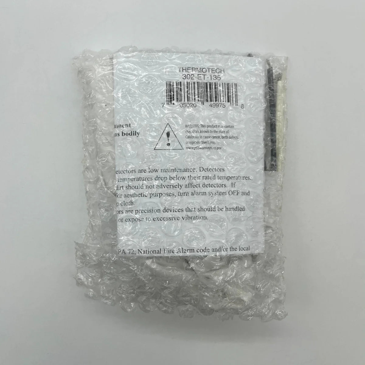 Thermotech 302-ET-135 heat detector with 135°F rate anticipation, suitable for all weather conditions, shown in the image.