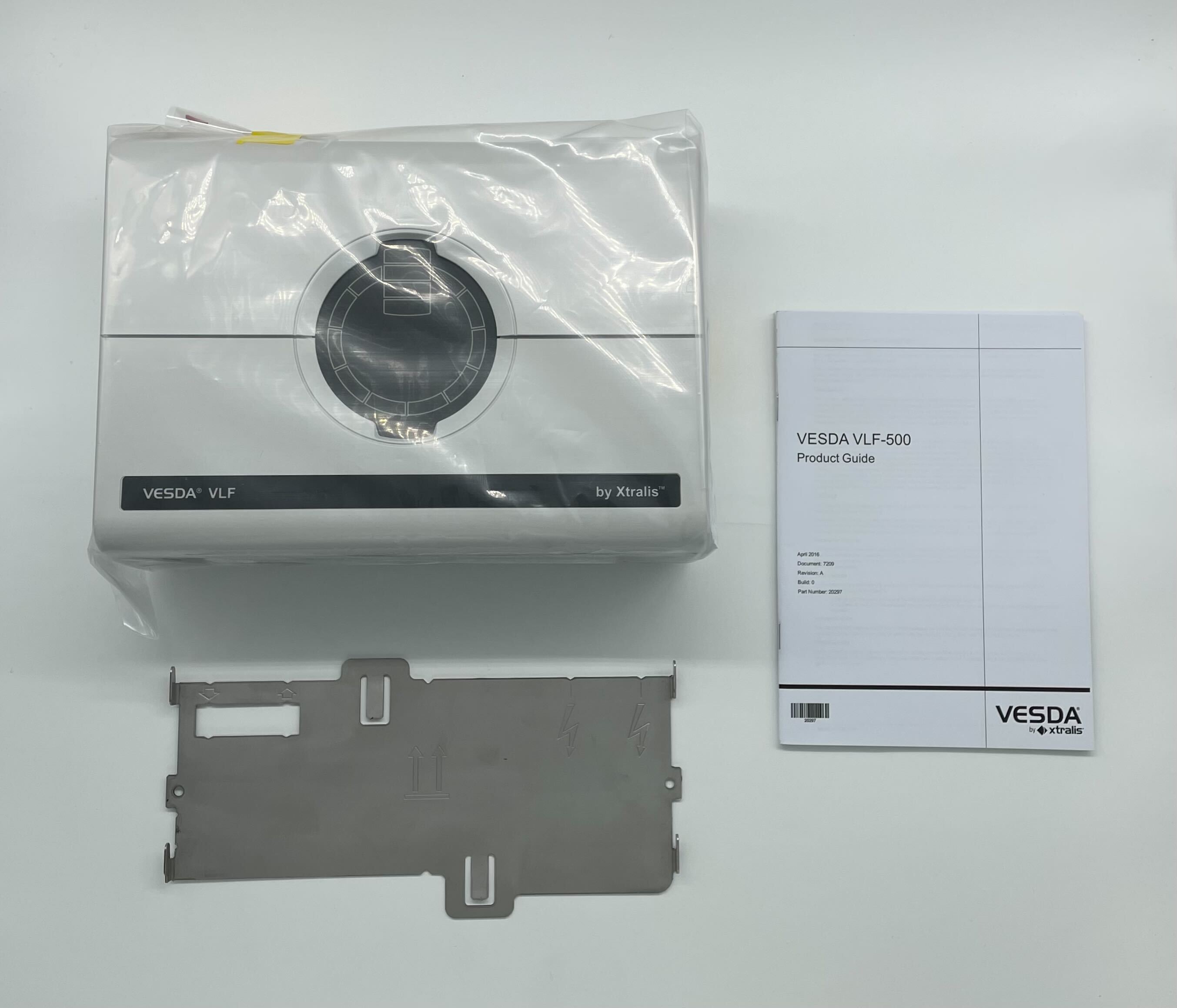Vesda VLF-500 smoke detector by VESDA, mounted on ceiling, with a sleek white design for early smoke detection.