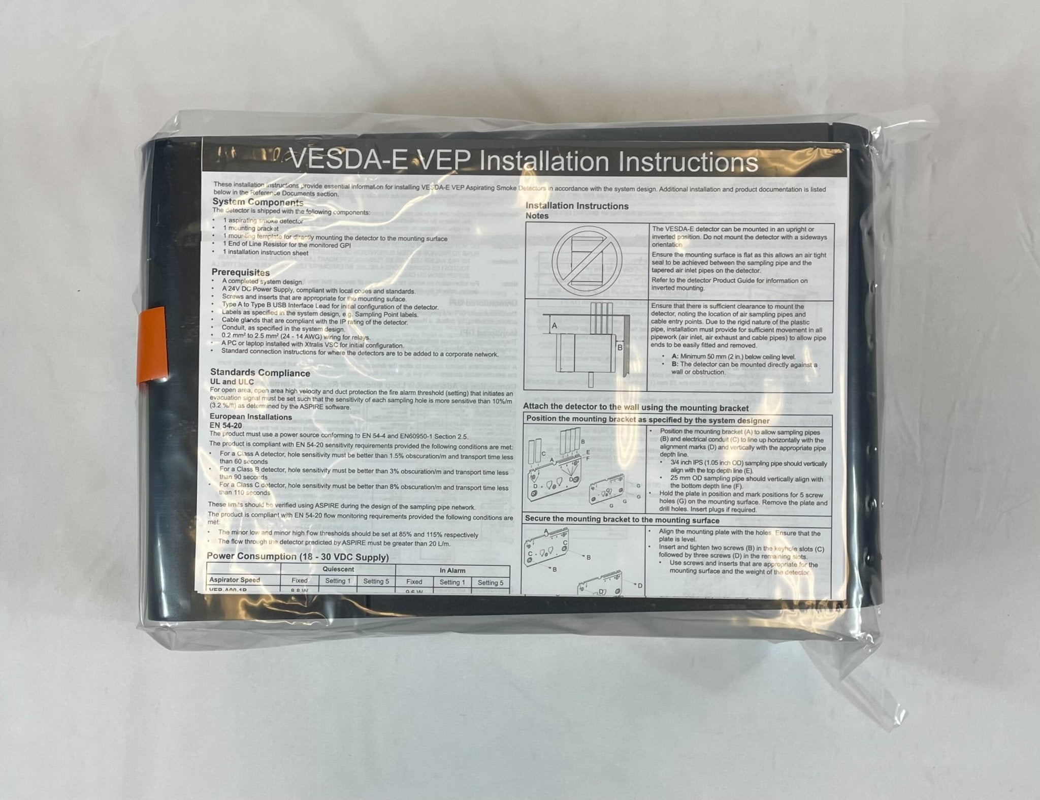 VESDA VEP-A00-1P smoke detector mounted on ceiling, part of VESDA fire detection system, featuring compact design for safety.