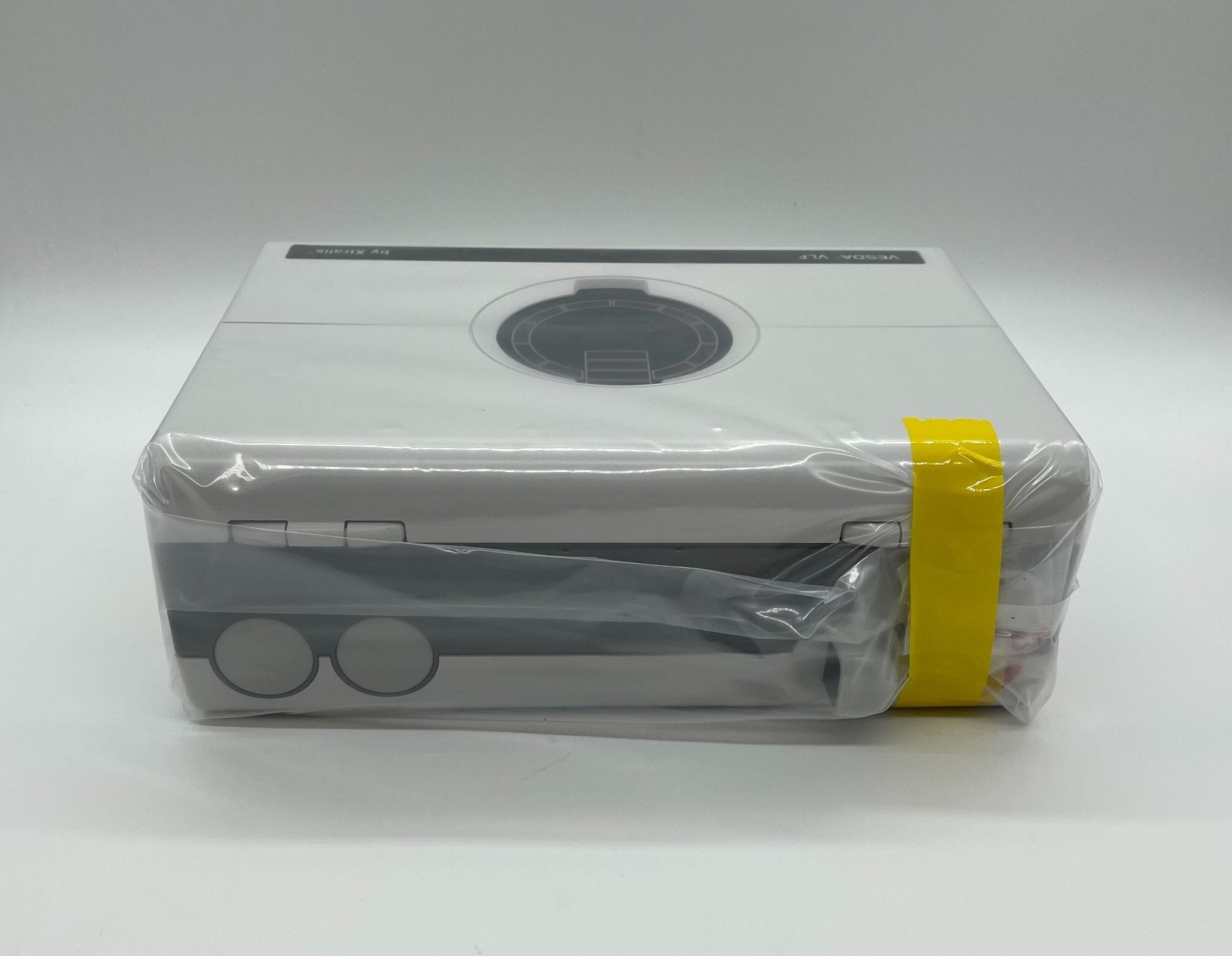 Vesda VLF-250-00 smoke detector by VESDA, shown mounted on ceiling with sensor and wiring visible.