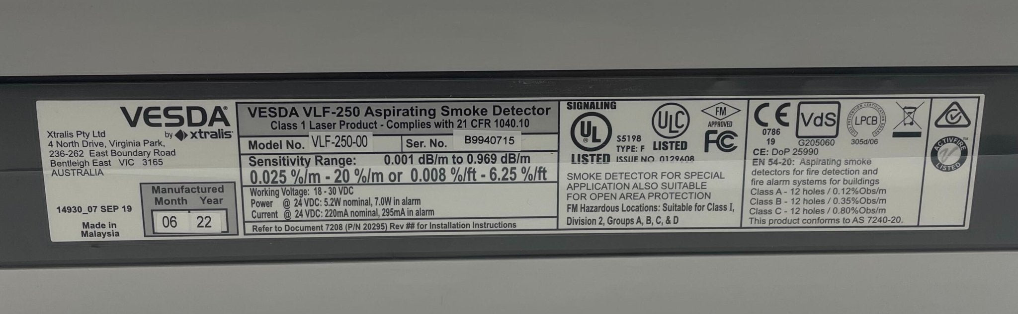 Vesda VLF-250-00 smoke detector mounted on ceiling, designed for fire detection and safety in commercial buildings.
