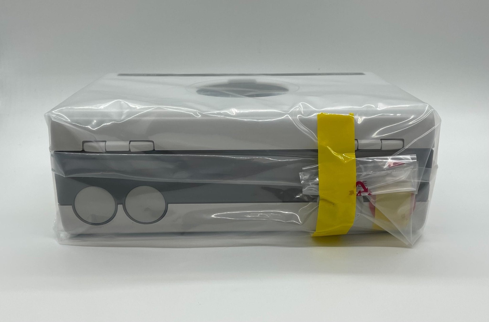 Vesda VLF-500 smoke detector mounted on ceiling, VESDA brand air sampling smoke detection device for fire safety.