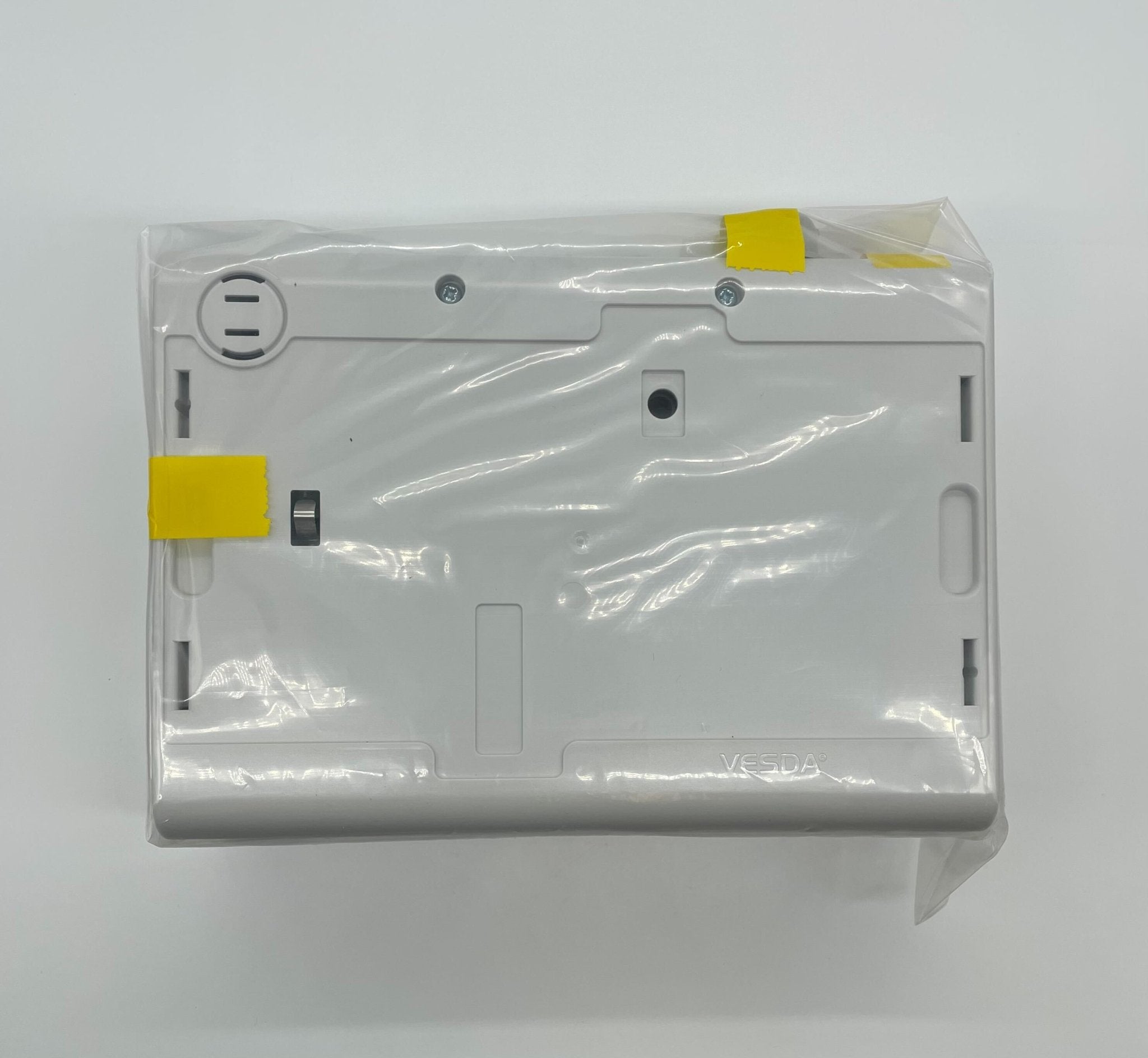 VESDA VLF-500 smoke detector by VESDA, mounted on ceiling, designed for fire detection in commercial spaces.
