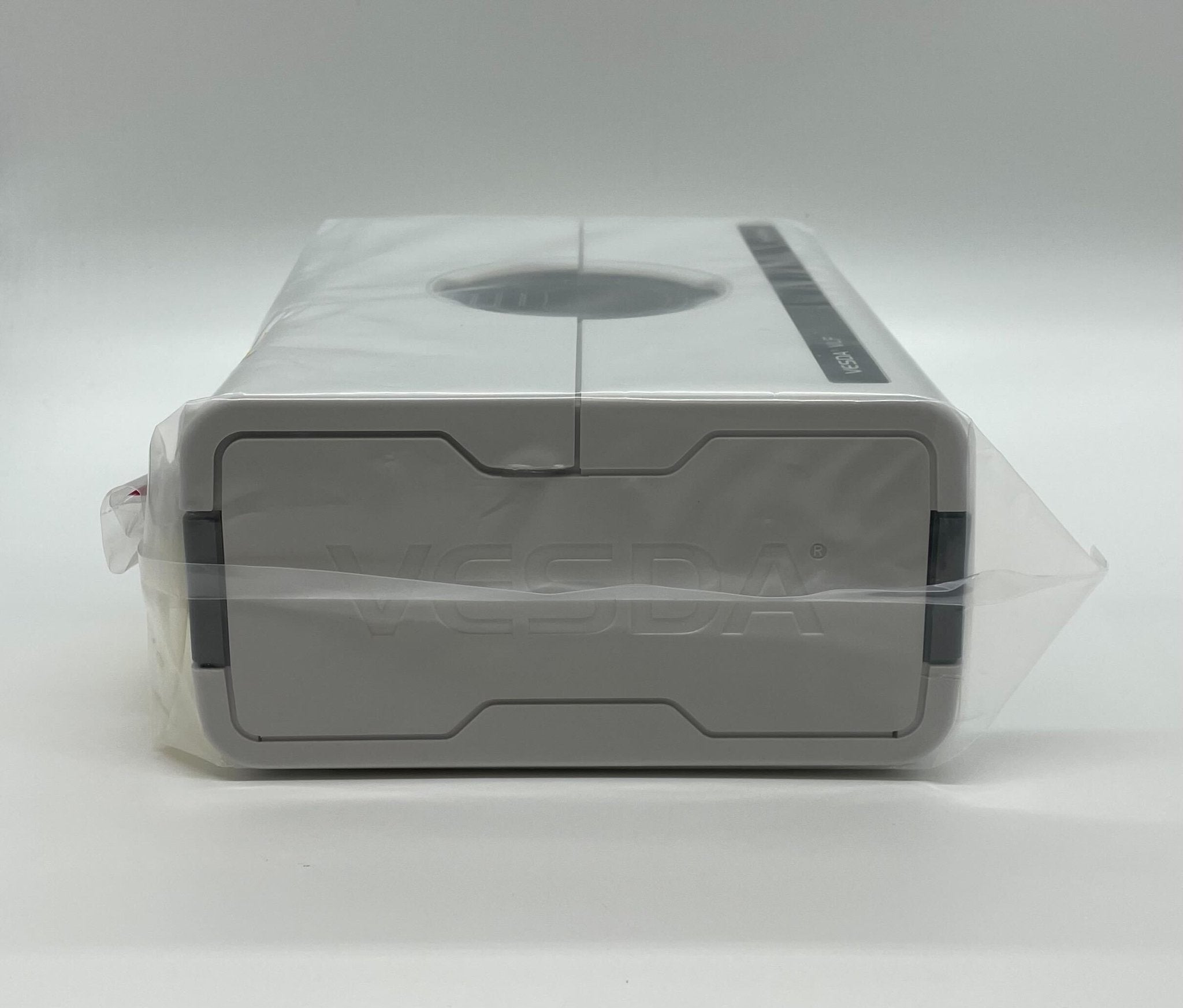 Vesda VLF-500 smoke detector by VESDA, compact fire detection device mounted on ceiling, with alert sensors and wiring.