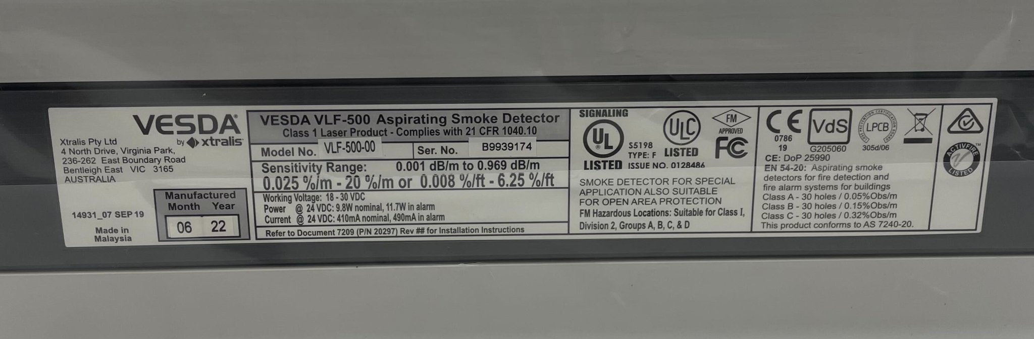 VESDA VLF-500 smoke detector by VESDA, mounted on ceiling, with sleek design and sensor components visible.