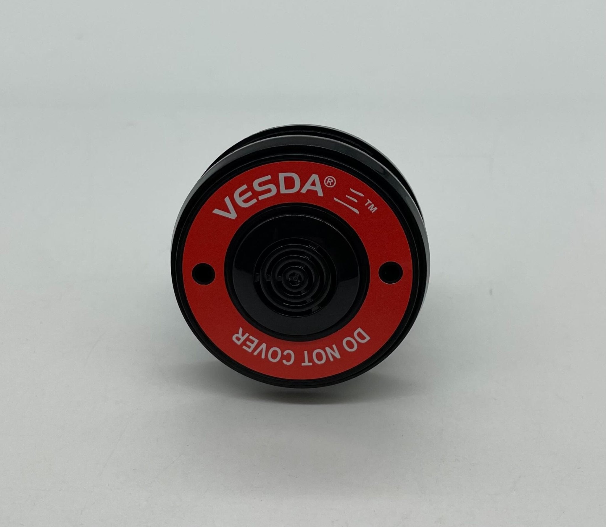 Vesda VSP-981-B fire alarm from VESDA, featuring a sleek white sensor with LED indicators and mounting bracket.