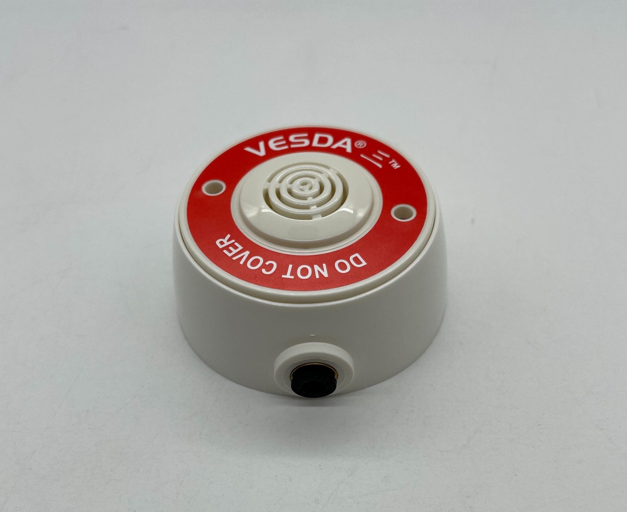 Vesda VSP-983-W fire alarm sensor with white casing, designed for smoke detection and safety monitoring.