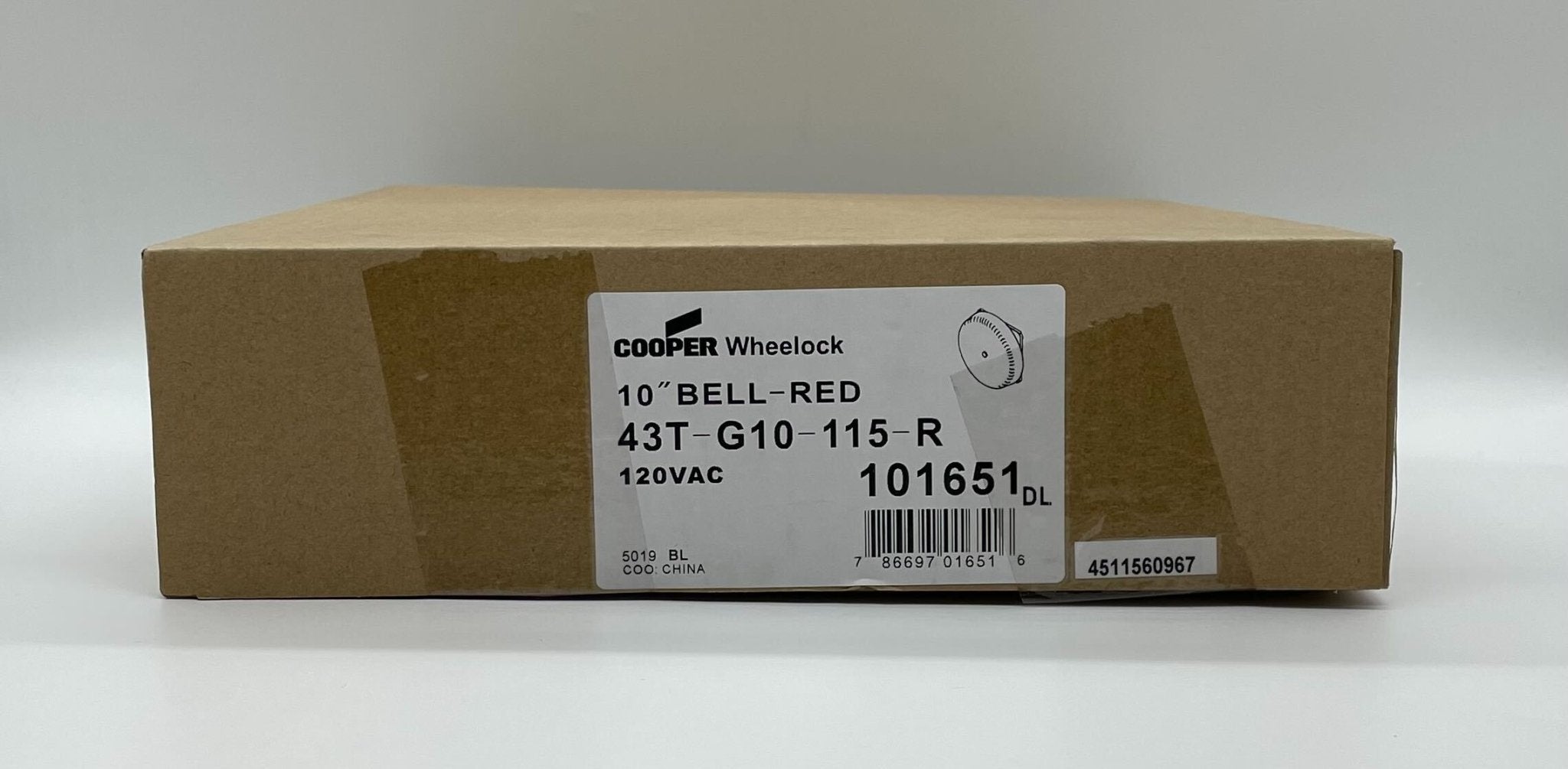 Eaton Wheelock 43T-G10-115-R bell with metal casing and mounting bracket, designed for industrial signaling applications