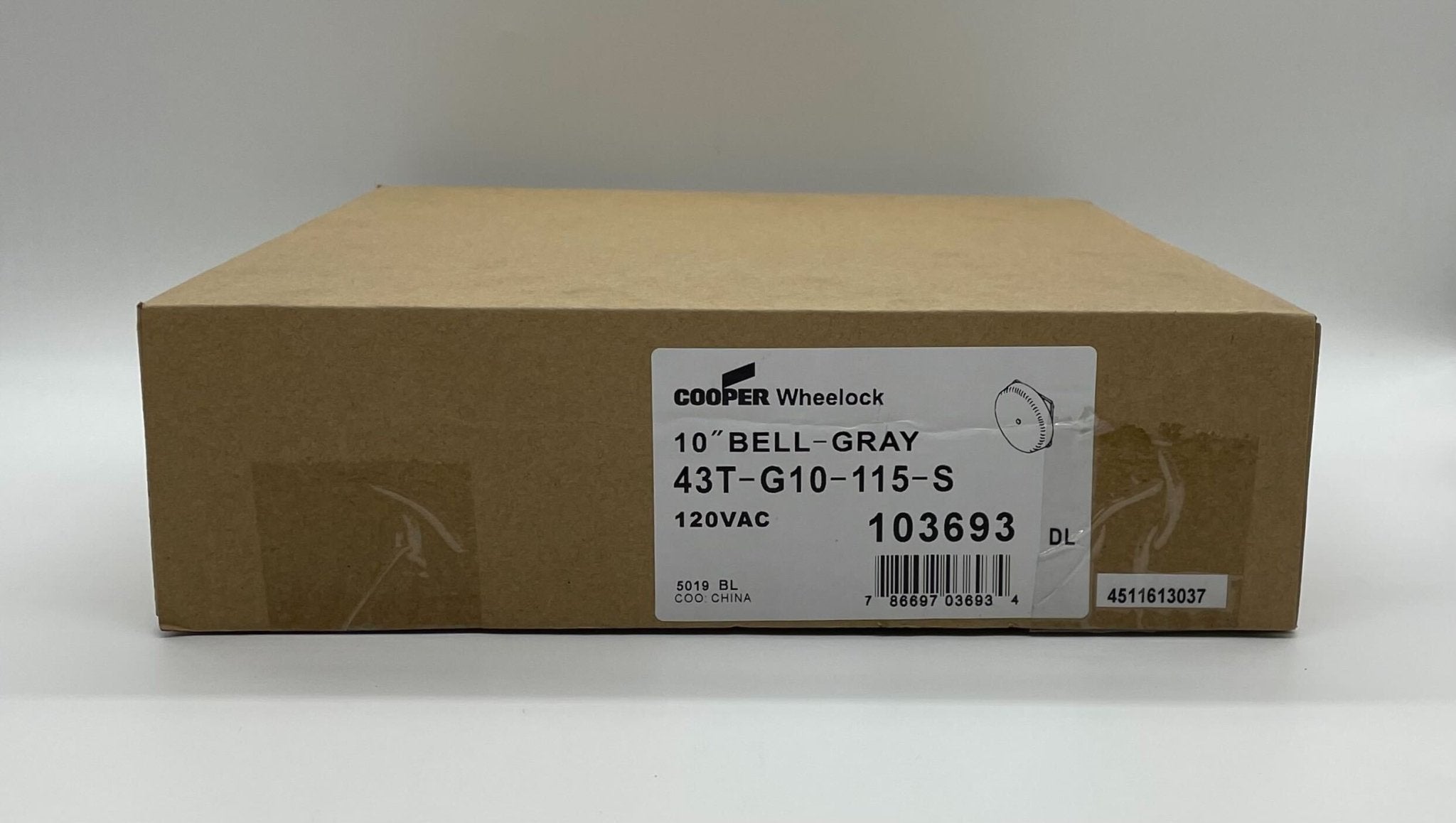 Eaton Wheelock 43T-G10-115-S bell, metal construction with mounting bracket, used for industrial or security signaling.