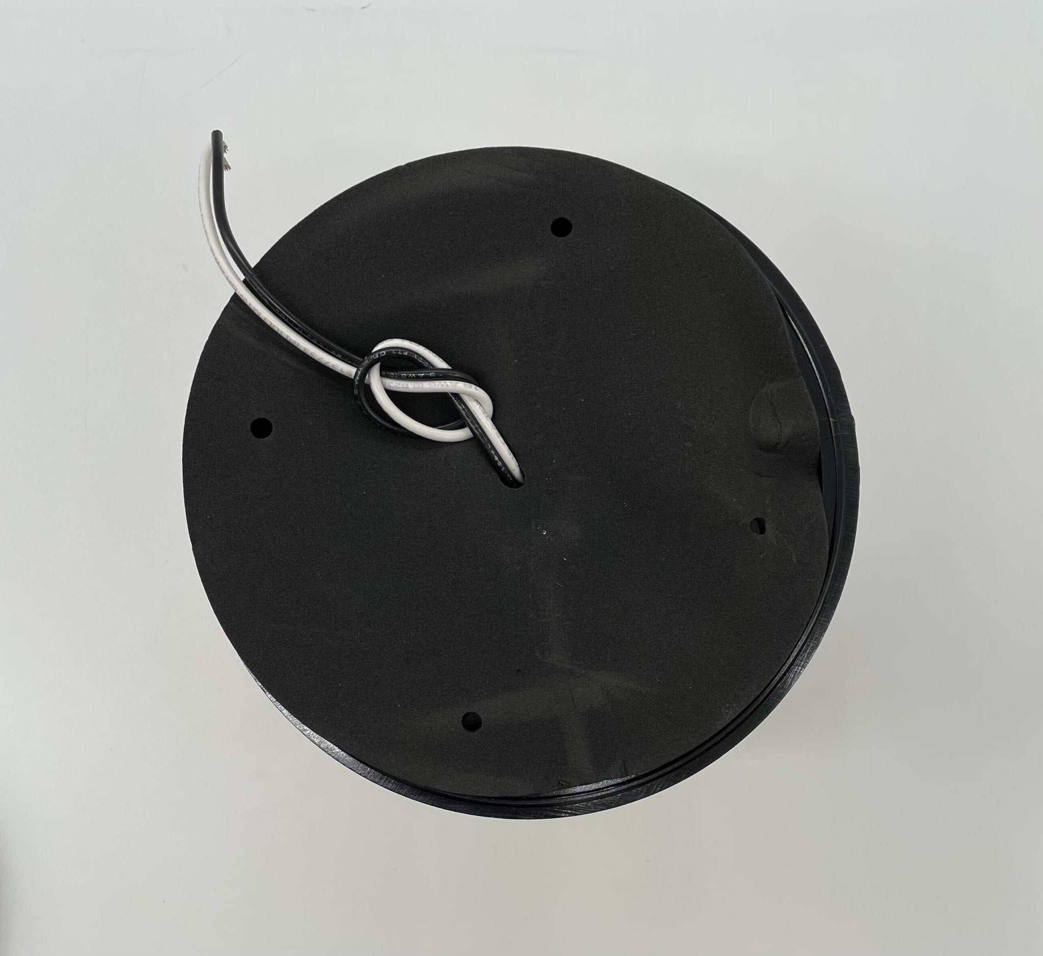 Eaton Wheelock AC-MAX-A strobe light mounted on ceiling, bright flashing warning light for emergency signaling.