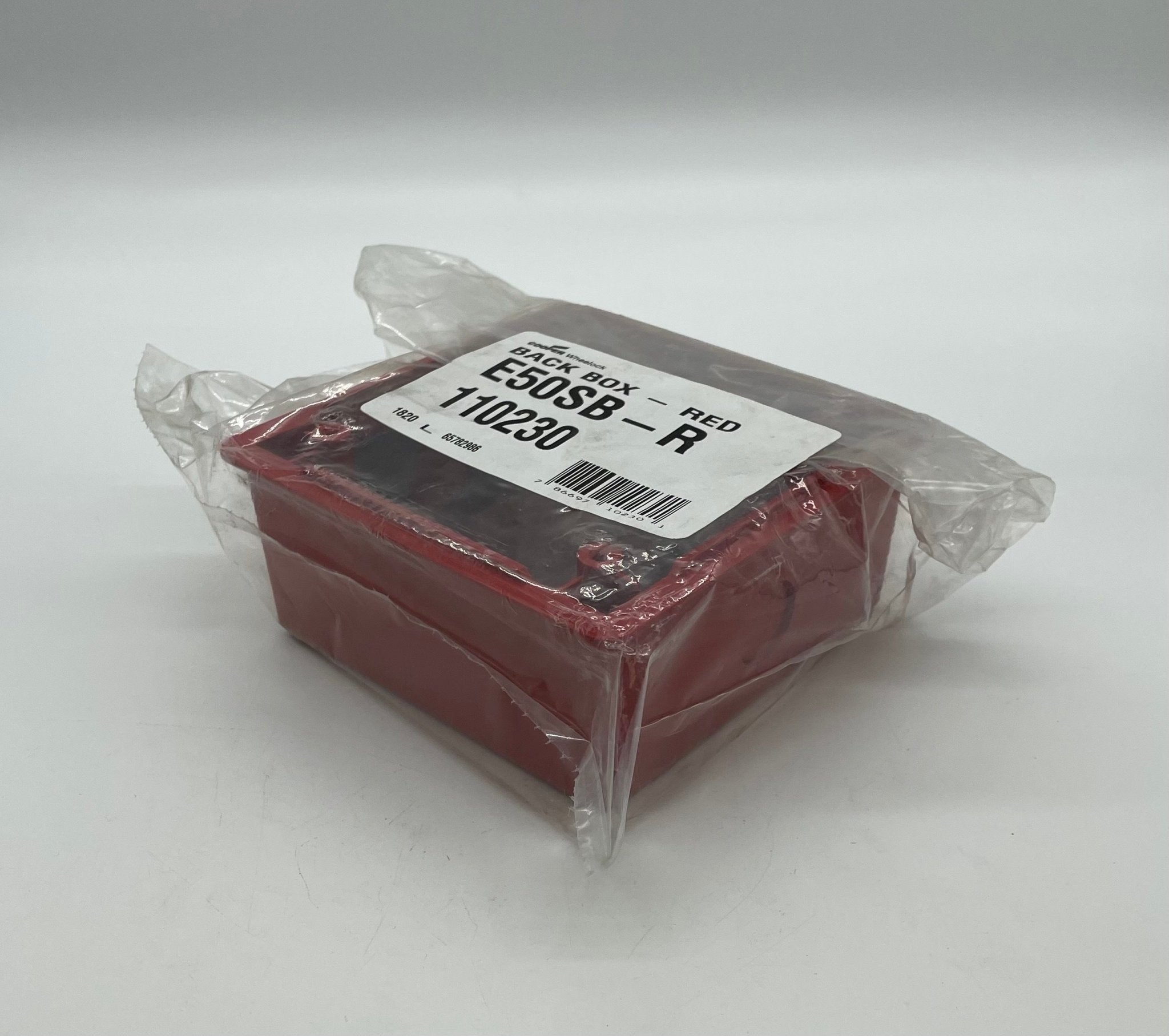 Eaton Wheelock E50SB-R backbox for fire alarm systems, metal enclosure with mounting brackets, in a clean, professional setting.