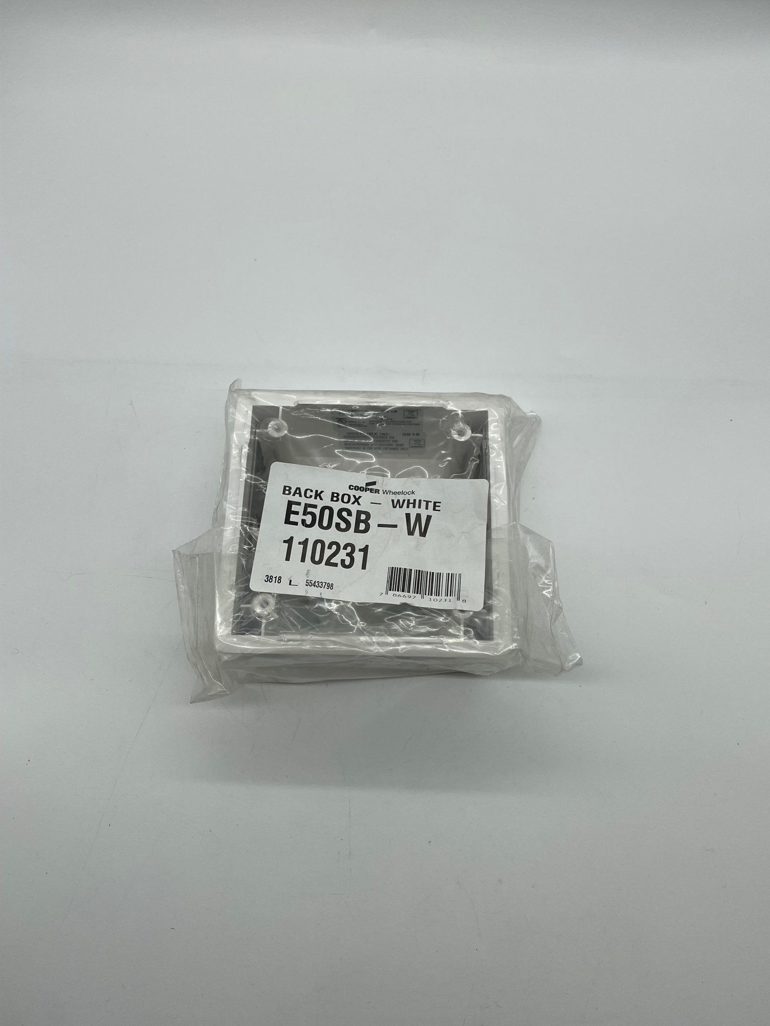Eaton Wheelock E50SB-W backbox, metal electrical enclosure with knockouts for wiring, used for security and fire alarm systems.