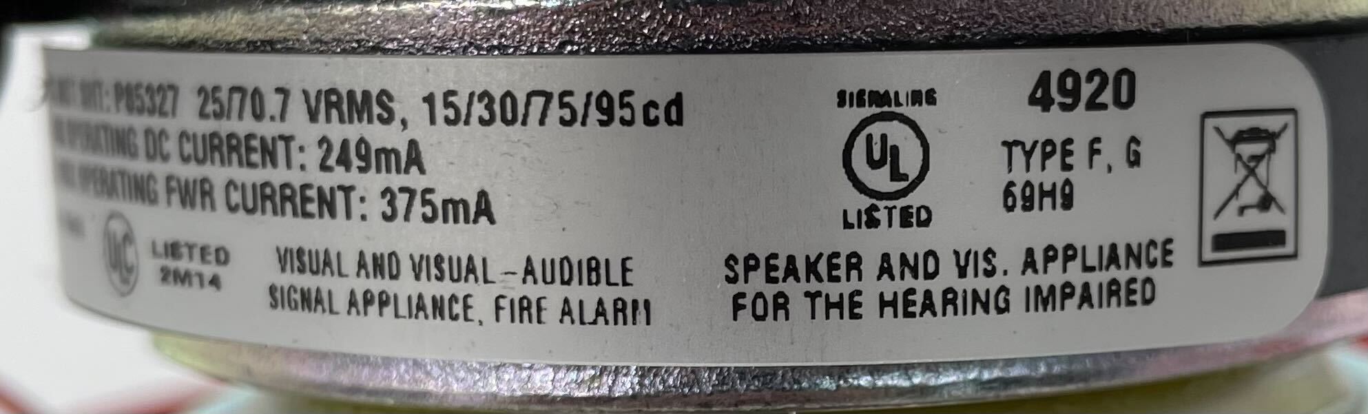Eaton Wheelock E90H-24MCC-FR speaker strobes with red housing and mounting base, designed for fire alarm alert systems.