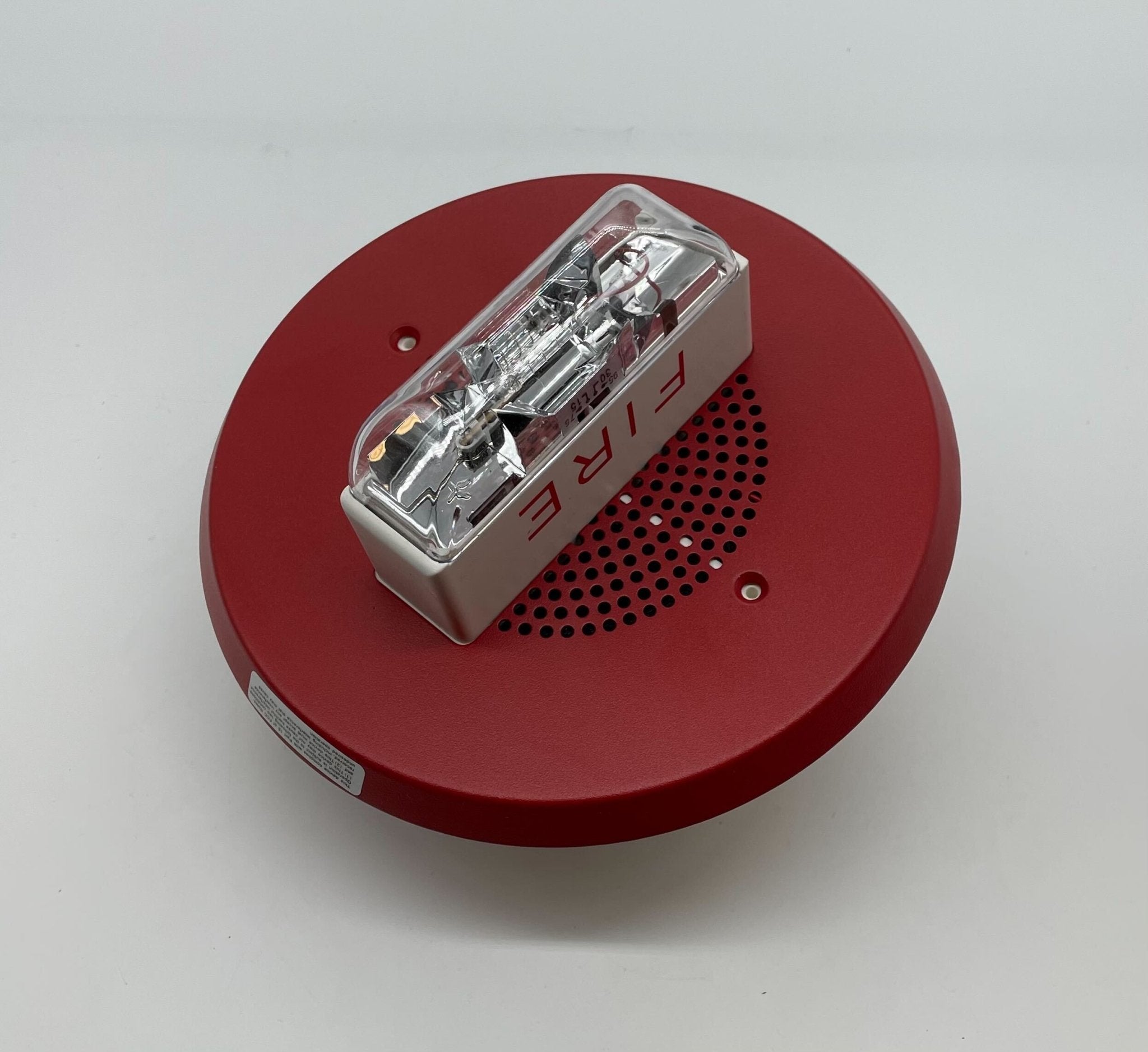 Eaton Wheelock E90H-24MCC-FR speaker strobe light mounted on ceiling, white emergency alert device by Eaton Wheelock