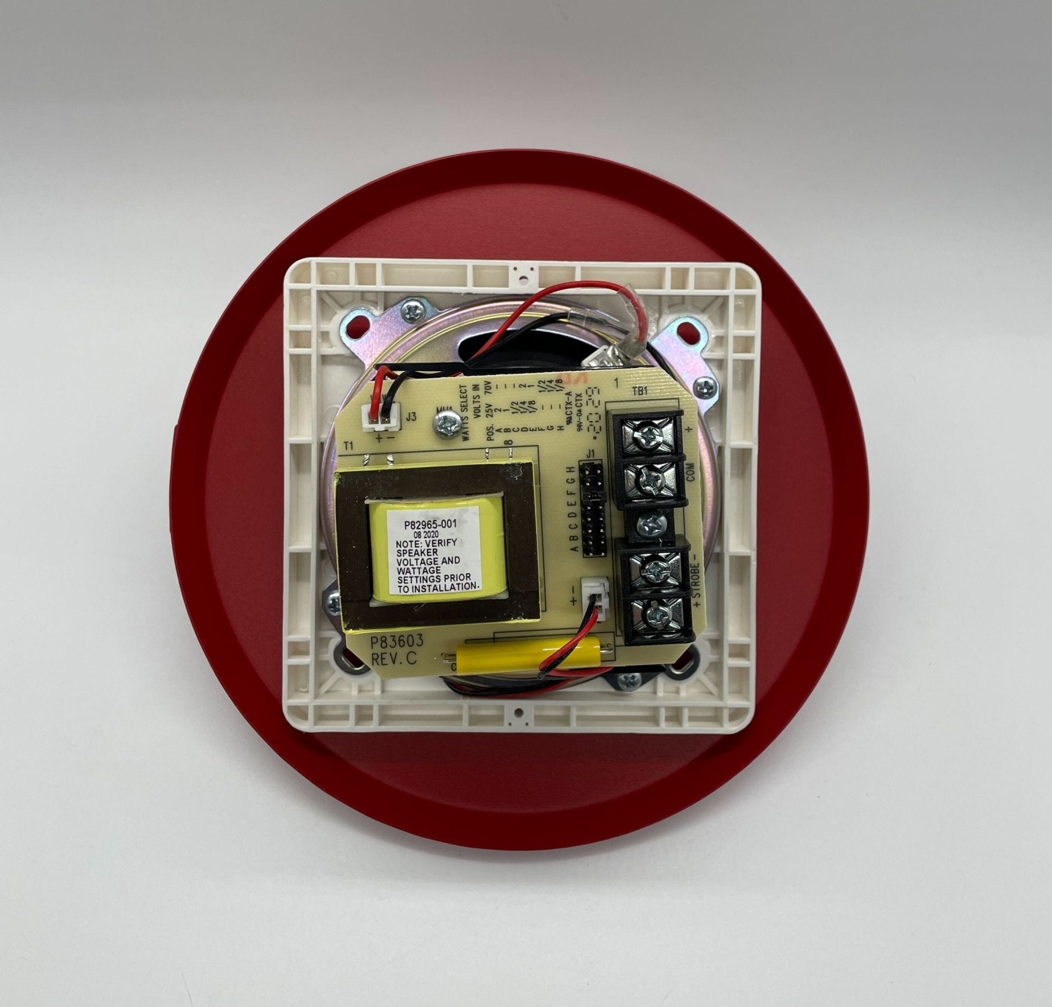 Eaton Wheelock E90H-24MCC-FR speaker strobe with red lens and mounting hardware, designed for emergency notification systems.