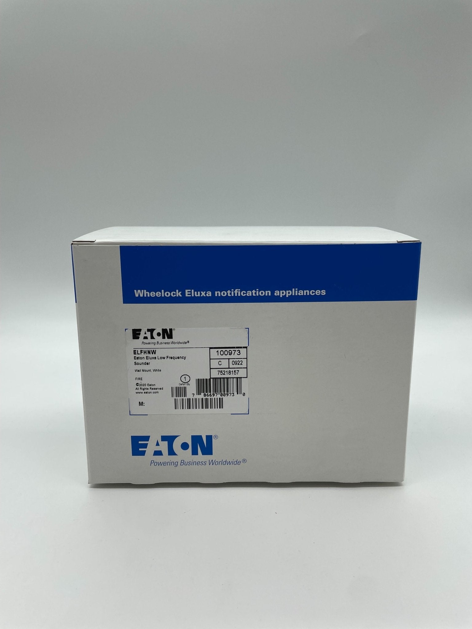 Eaton Wheelock ELFHNW sounder with black housing and mounting bracket, designed for emergency notification systems.
